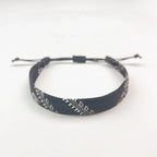 Armbånd med sorte geometriske mønstre Keffiye arabisk
