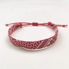 Armbånd med røde geometriske mønstre Keffiye arabisk
