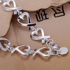 Bracelet avec symboles infini en forme de coeur