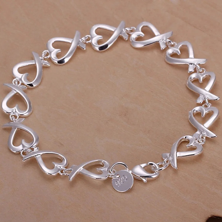 Bracelet avec symboles infini en forme de coeur