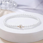 Weißes Armband mit Initiale k