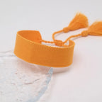 Handgemachtes brasilianisches Armband in sanften Pastellfarben orange