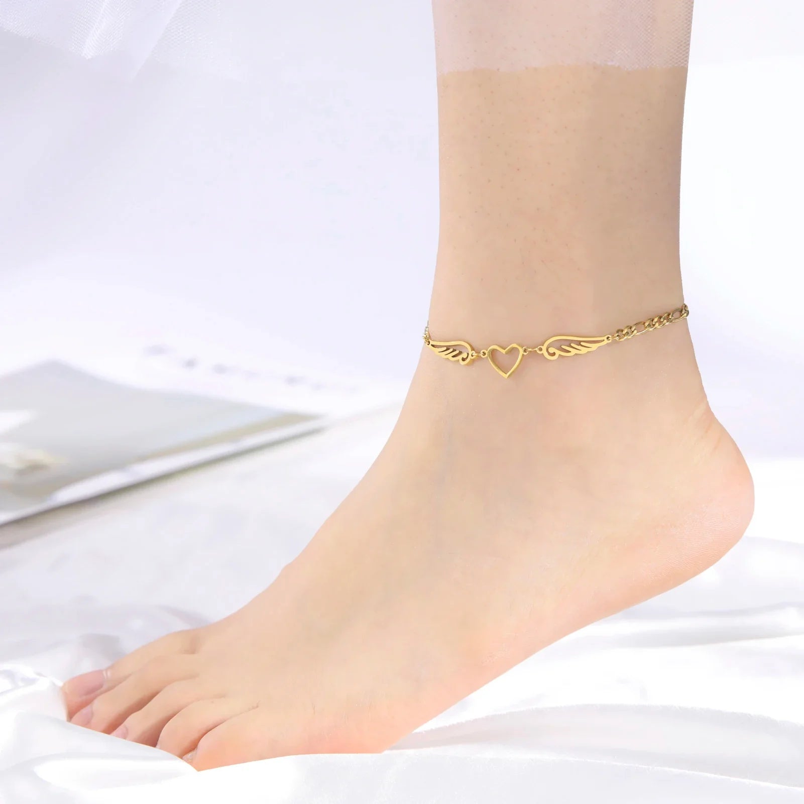 Gold heart and angel wings bracelet