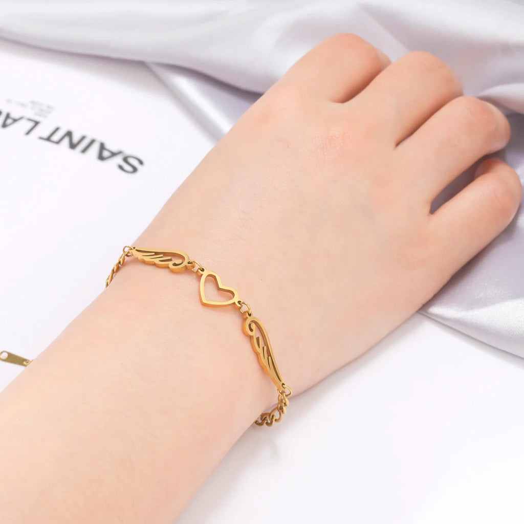 Bracelet coeur et ailes d'ange or