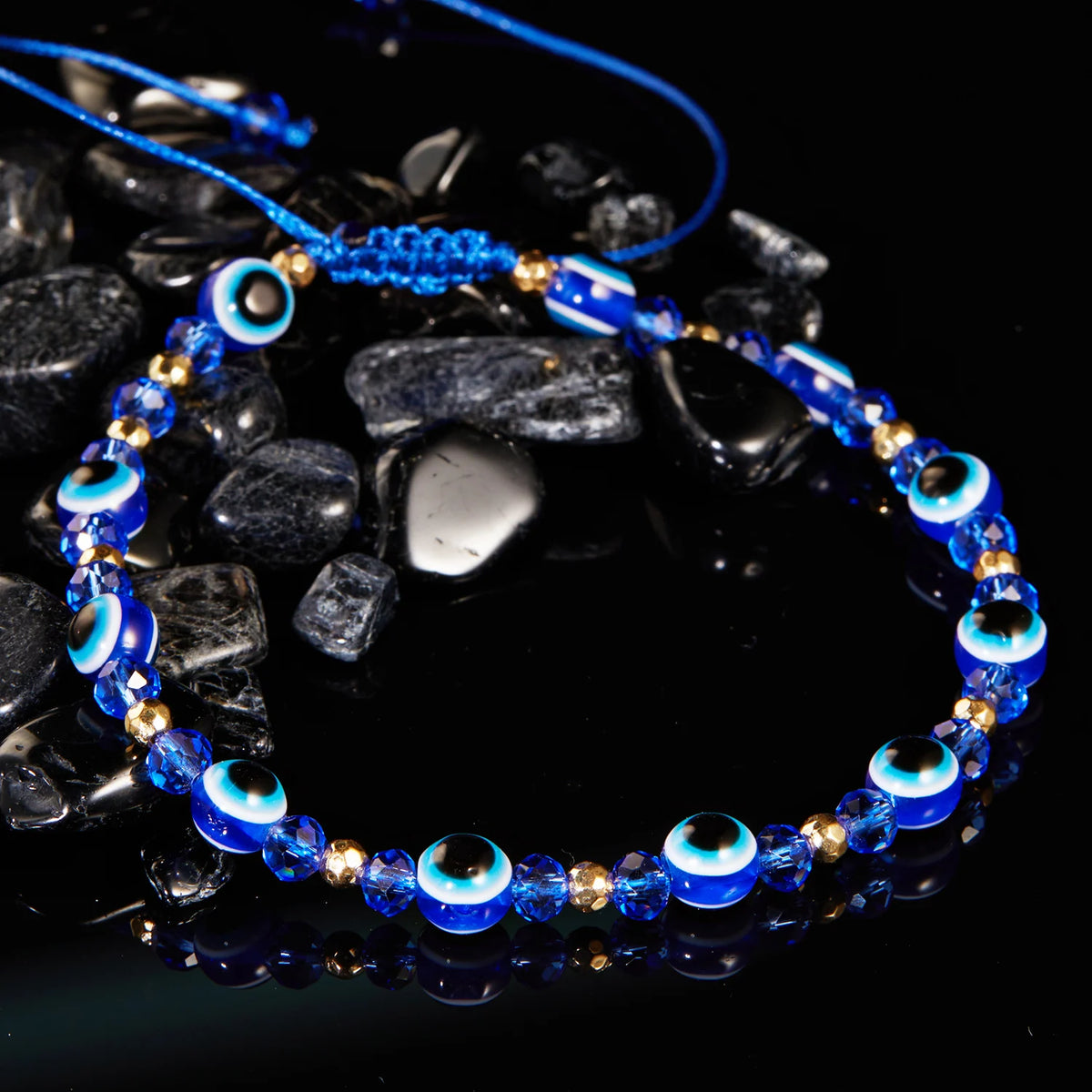 Bracelet cordon avec multiples perles oeil bleu protecteur bleu foncé