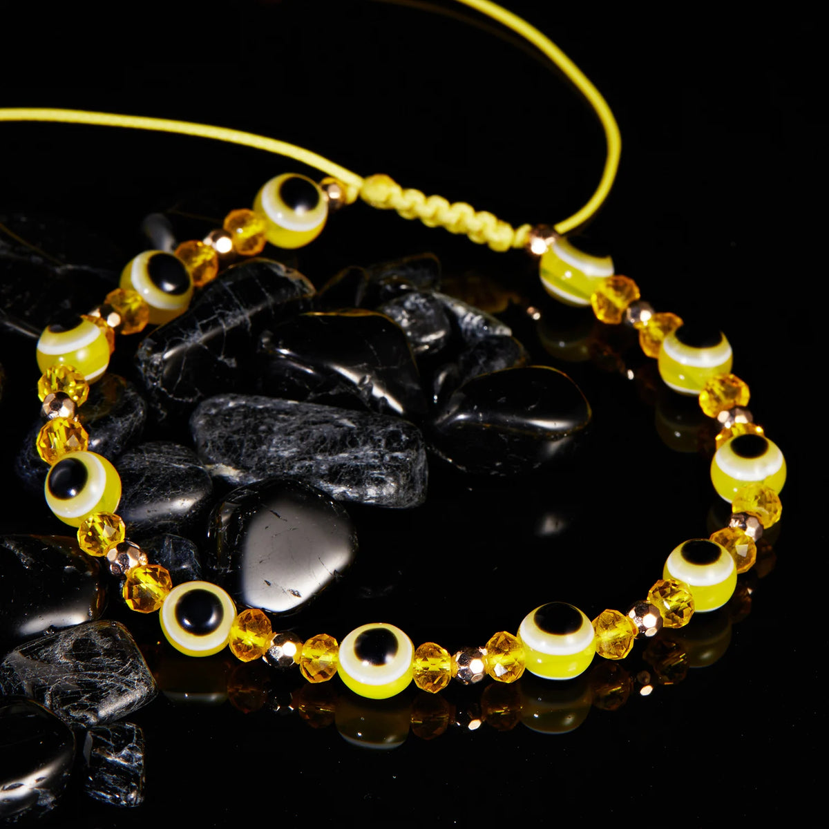 Bracelet cordon avec multiples perles oeil bleu protecteur jaune