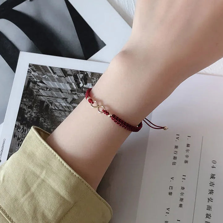 Bracelet cordon tressé et symbole infini porte-bonheur bordeaux