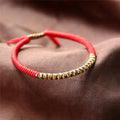 Bracelet de Chance Tibétain en Coton rouge