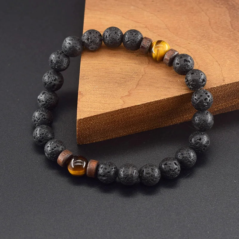 Bracciale di protezione in pietre laviche e perle di occhio di tigre