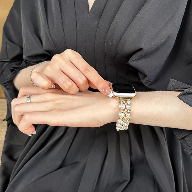 Ersatzarmband für die Apple Watch mit Strass und goldfarbenen Perlen