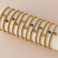 Bracelet doré avec pierre de naissance pour femme janvier
