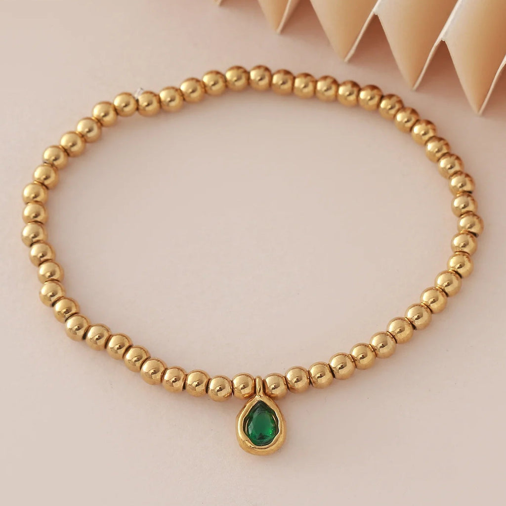Bracelet doré avec pierre de naissance pour femme