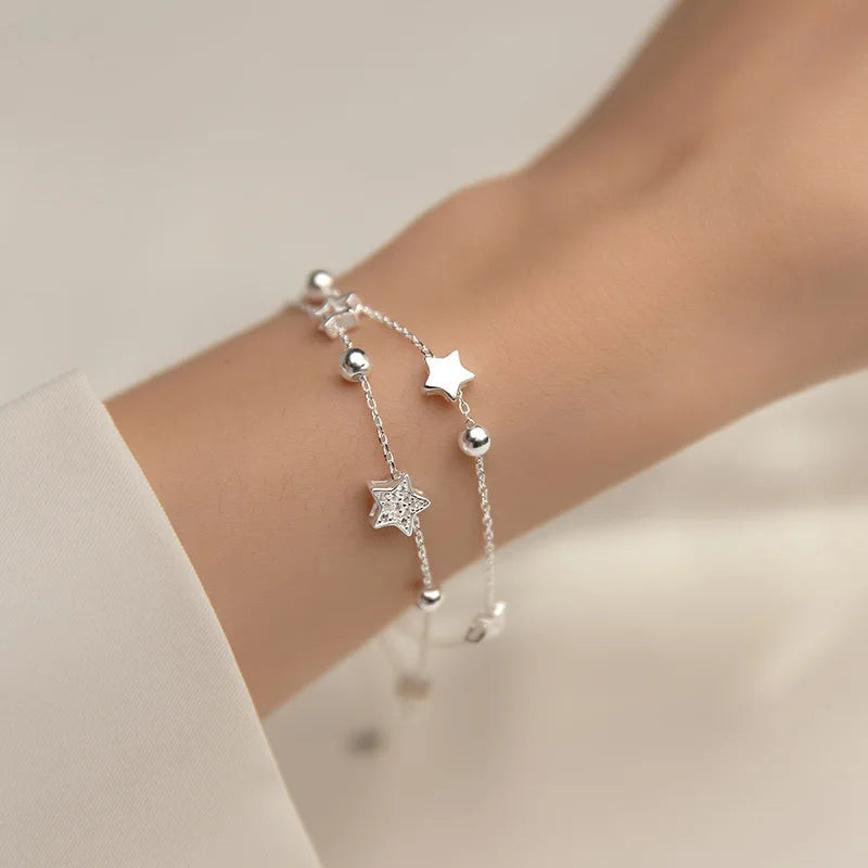 Doppelreihiges Armband mit versilberten Sternen