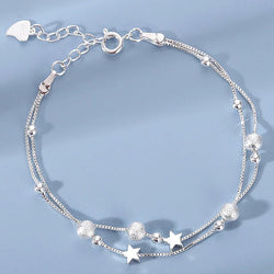 Bracelet double rang étoiles et perles sablées