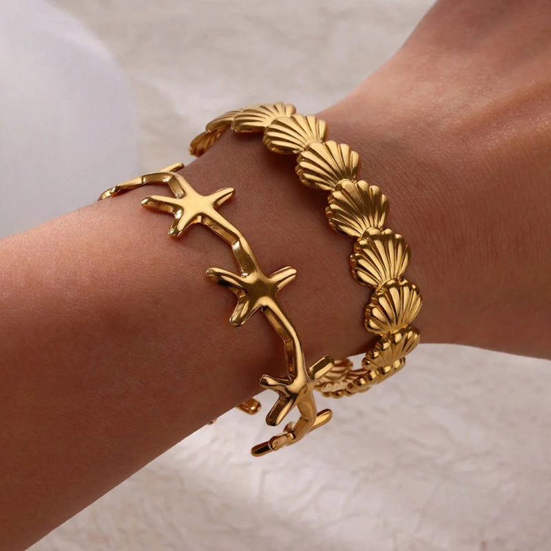 Elegantes Armband Muscheln Seestern und Jakobsmuscheln gold