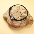 Bracelet en corde avec le symbole juif étoile de David noir et argent