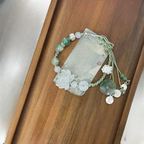 Bracelet en Corde avec Perles et Fleur de Lotus