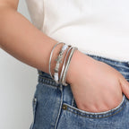 Armband aus Leder mit Muschel und Seestern in Silber