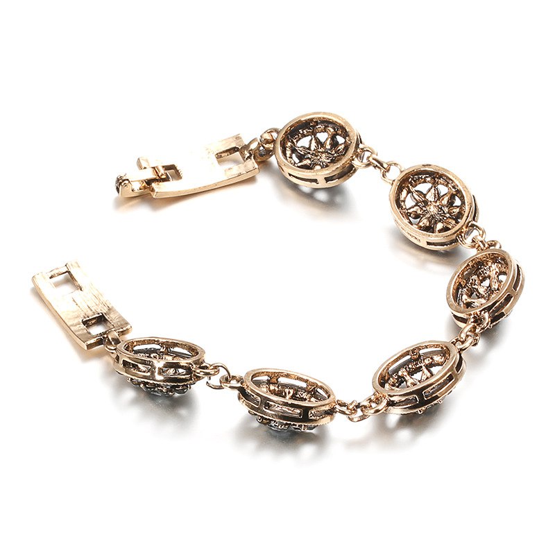 Damesarmband in etnische stijl met zwarte stenen 