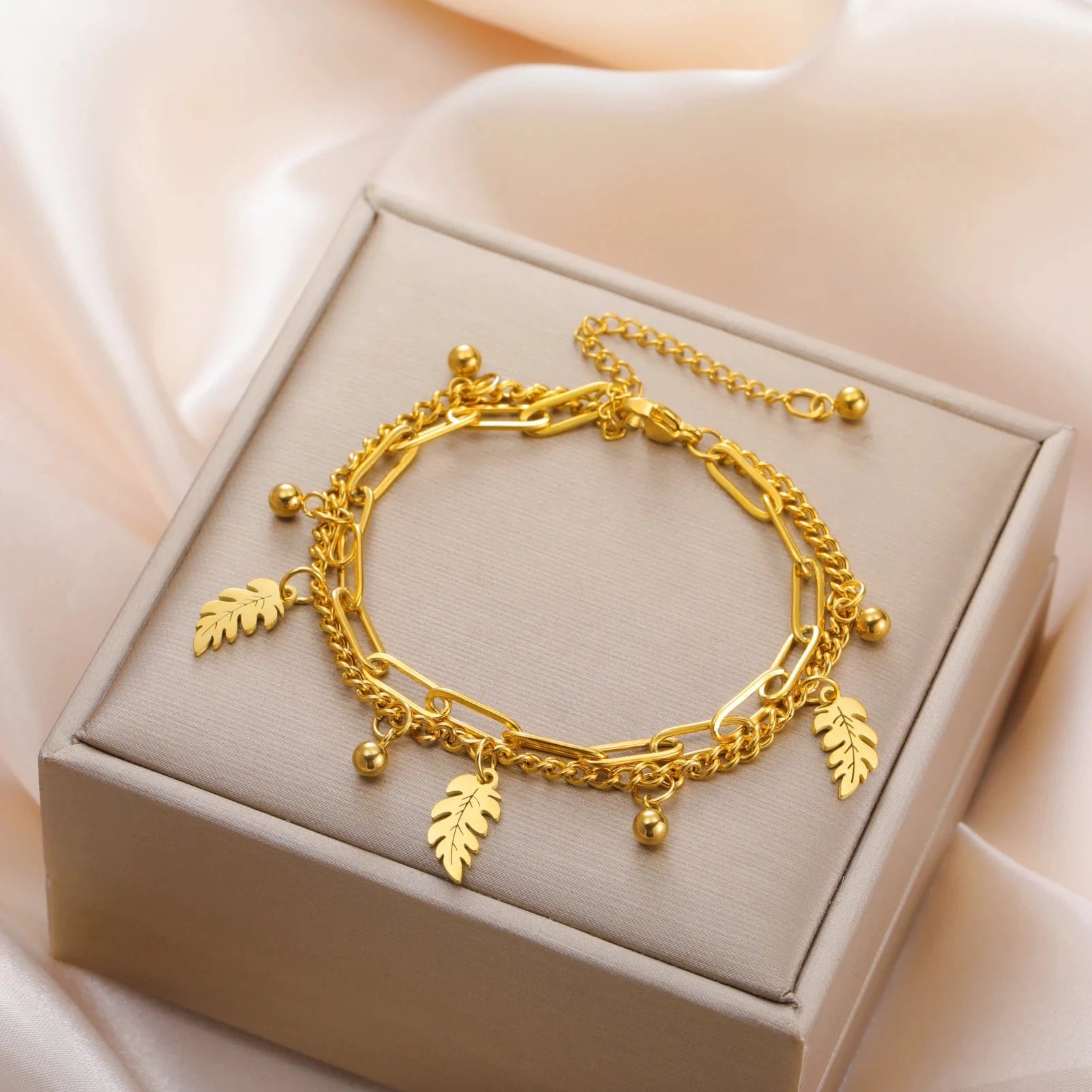 Pálmalevél és cirkón karkötő 