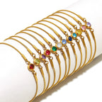 Bracciale rigido con pietra di nascita colorata