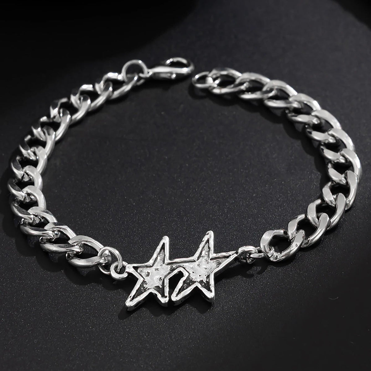 Armbånd med cubansk kædeled og dobbelt sølvstjerne