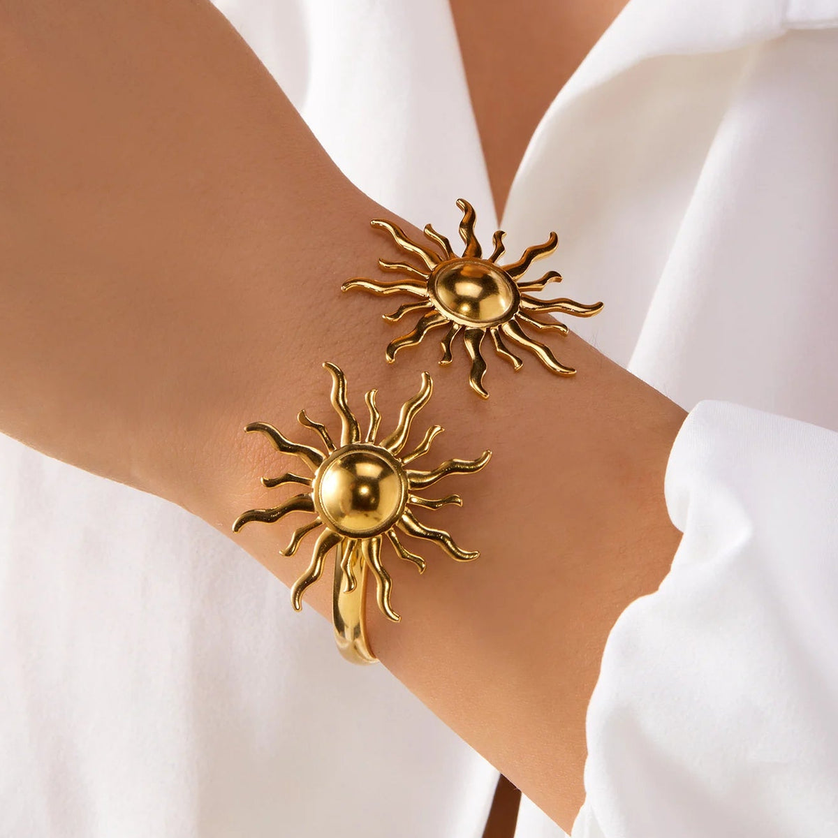 Bracelet ouvert avec 2 soleils