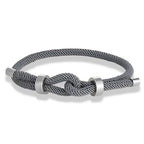 Bracelet moderne en corde tressée avec nœud gris