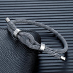 Bracelet moderne en corde tressée avec nœud gris 