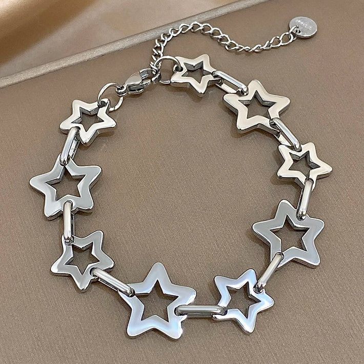 Armbånd med flere geometriske stjerner i sølv