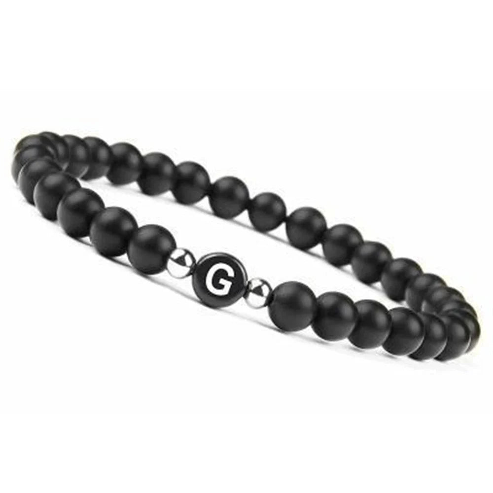 Sort armbånd med initial g