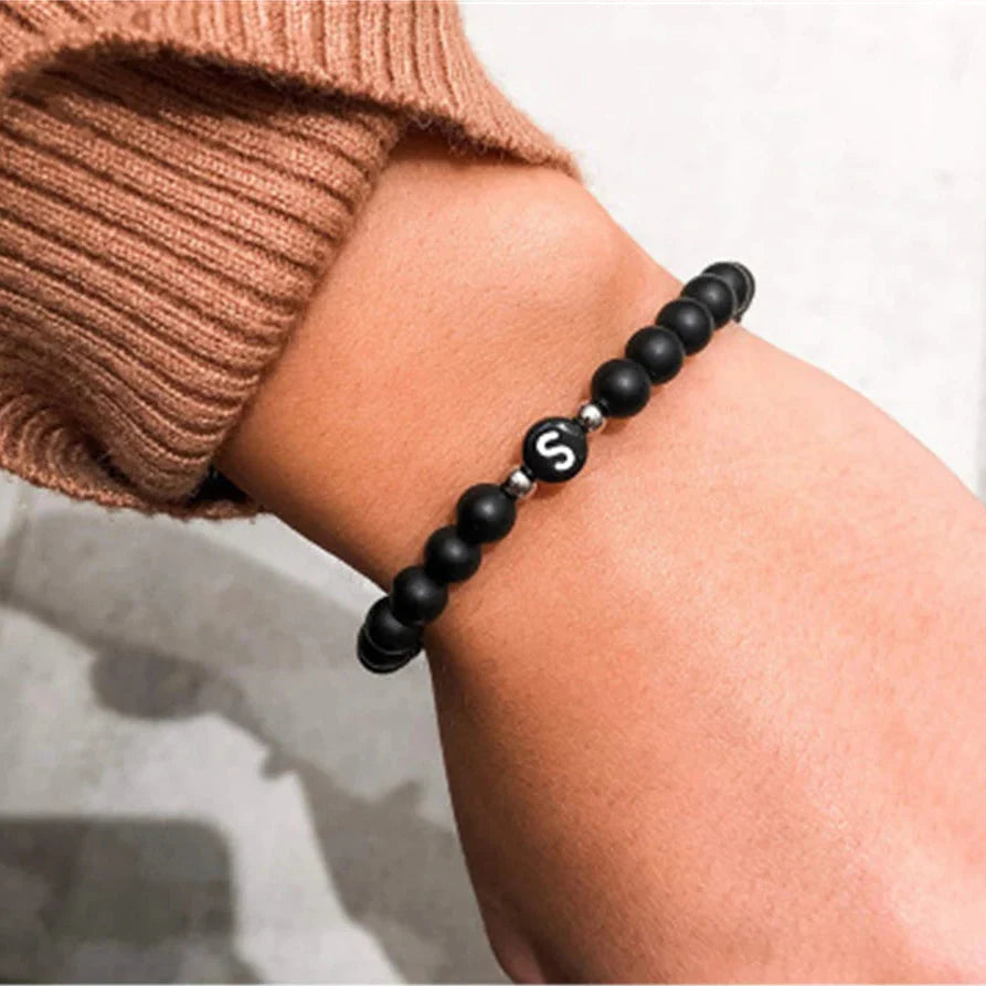 Bracelet noir initiale