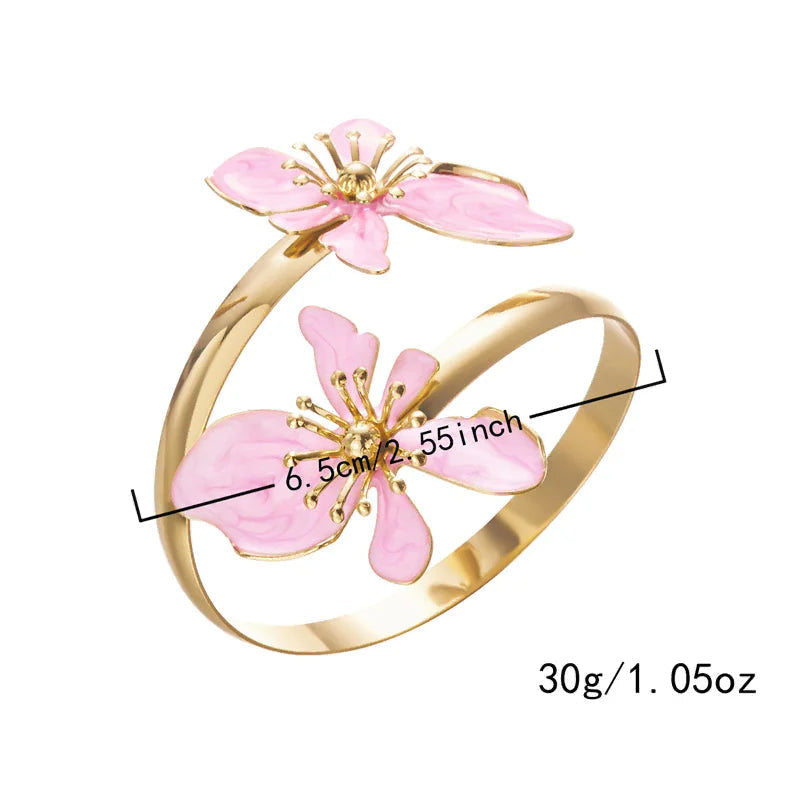 Bracelet ouvert orné de fleurs exotiques