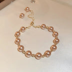 Armbånd med perler i moderne beige stil