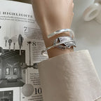 Silbernes Federarmband für Damen