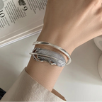 Silbernes Federarmband für Damen