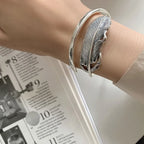 Silbernes Federarmband für Damen