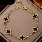 Four-leaf clover bracelet with black mother-of-pearl effect