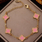 Four-leaf clover bracelet with pink mother-of-pearl effect