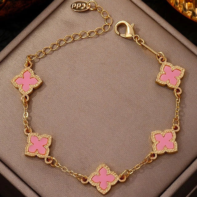 Four-leaf clover bracelet with pink mother-of-pearl effect