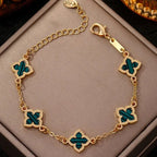 Four-leaf clover bracelet with green mother-of-pearl effect