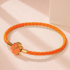 Bracelet Tressé en Cuir avec Trèfle à 4 Feuilles orange
