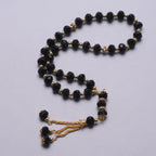 Elegant muslimsk bedekæde - Islamisk Tasbih med 33 sorte og gyldne perler