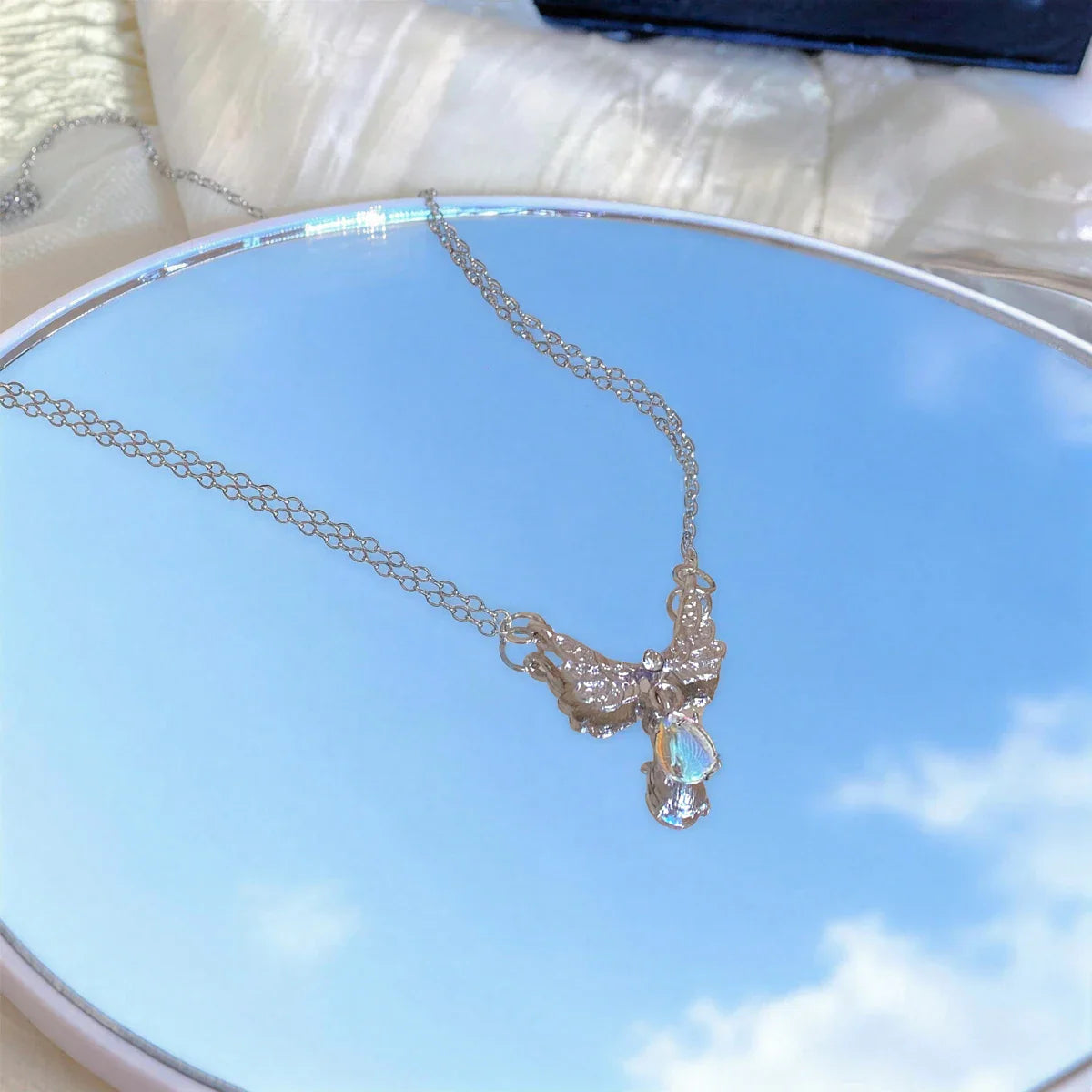 Collier avec pendentif ailes d'ange