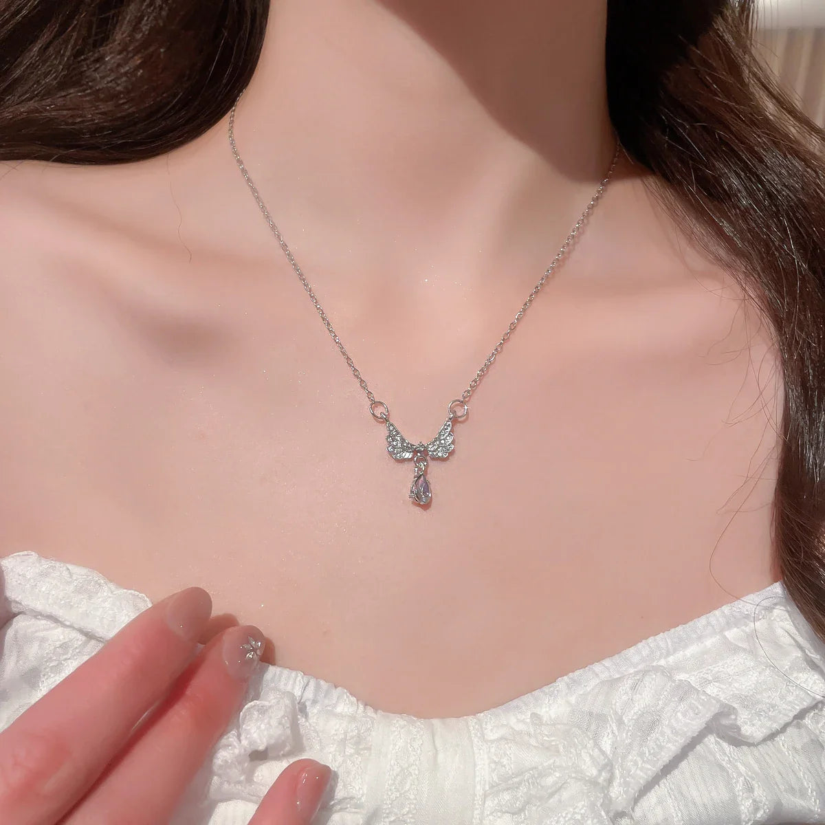 Collier avec pendentif ailes d'ange