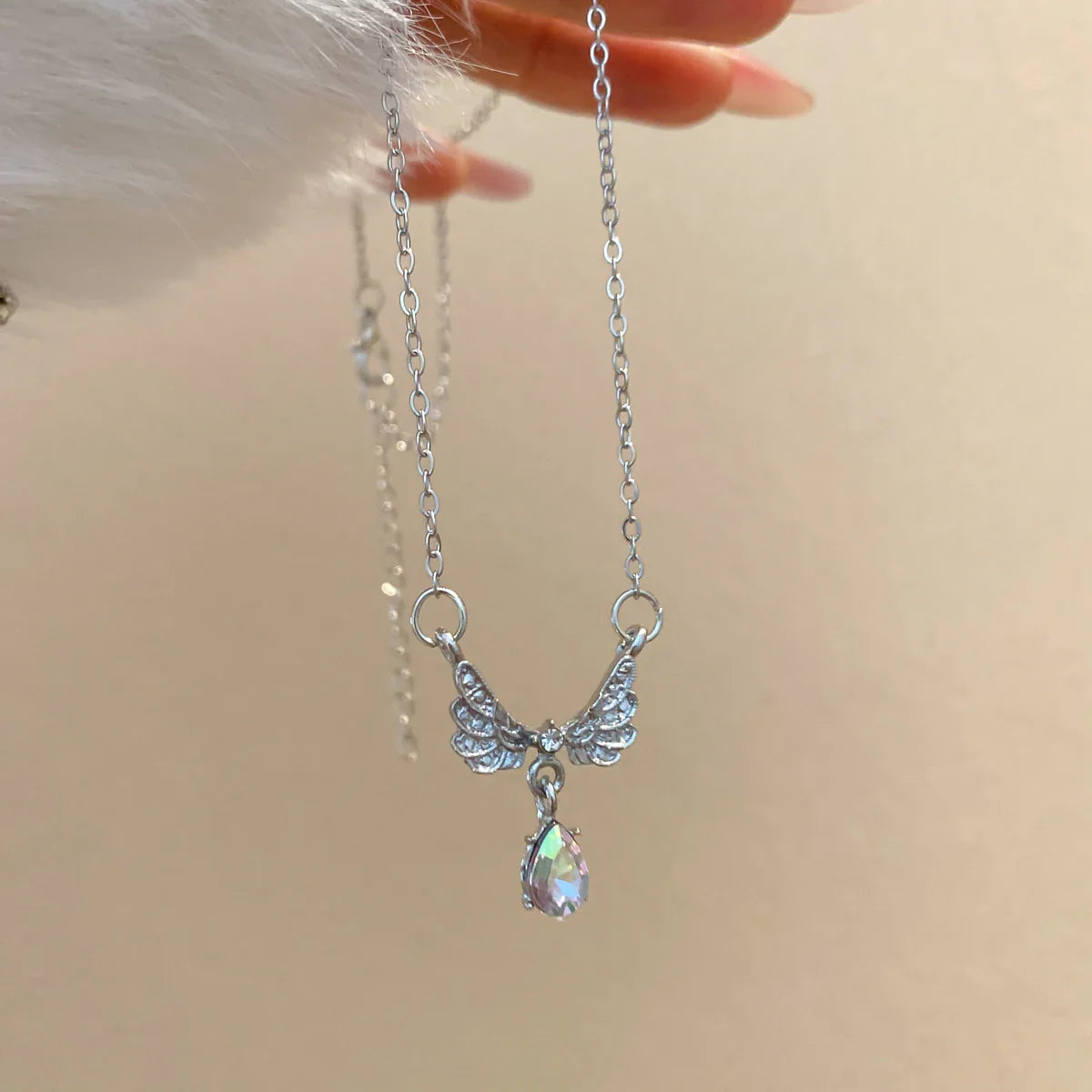 Collier avec pendentif ailes d'ange
