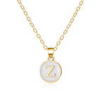 Halsband med vit hängsmycke initial z