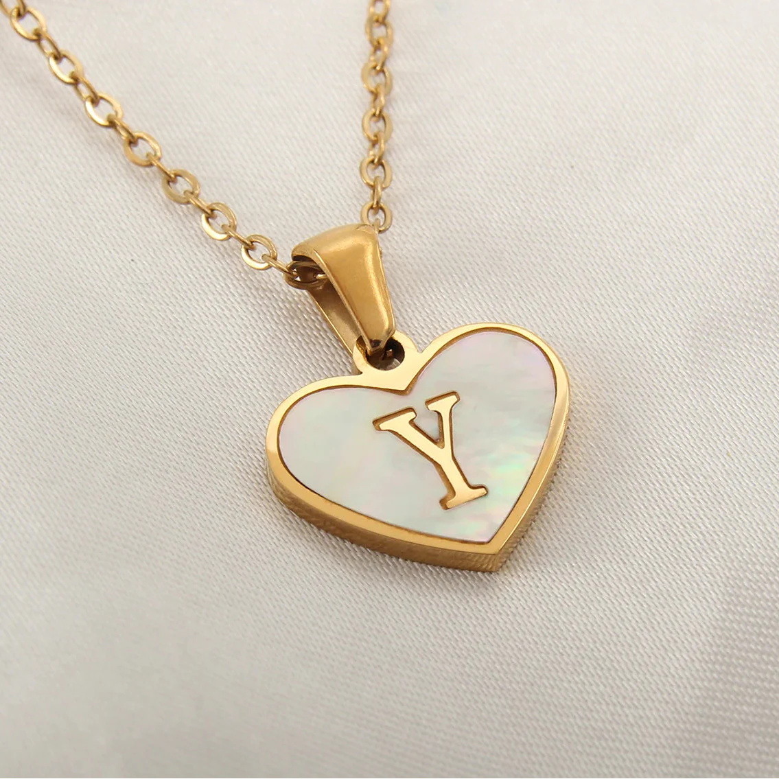 Necklace with white heart pendant initial y