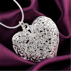 Necklace with heart pendant and foliage