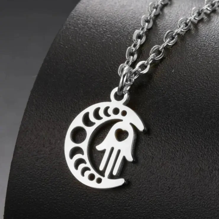 Ketting met islamitische hanger halve maan en Arabische Fatma-hand in zilver